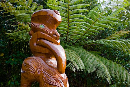 sticking out her tongue - Maori wood carving, Ships Cove, Marlborough Sounds, South Island, New Zealand, Pacific Stock Photo - Rights-Managed, Code: 841-02718711