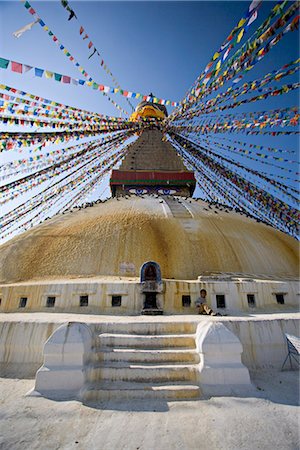 simsearch:841-02718675,k - Stupa bouddhiste appelée Boudha à youmir, Katmandou, Népal. Prise à Lhosar, le nouvel an tibétain, d'où l'abondance de la prière de nouveaux indicateurs. Photographie de stock - Rights-Managed, Code: 841-02718728