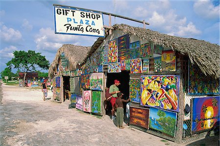 souvenir shop caribbean - Gift shop covered in artwork, Punta Cana, Dominican Republic, West Indies, Caribbean, Central America Stock Photo - Rights-Managed, Code: 841-02710042