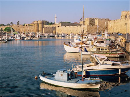 simsearch:841-05796762,k - Moored fishing boats and the harbourside fortifications in the old town, Rhodes Town, Rhodes, Dodecanese Islands, Greek Islands, Greece, Europe Stock Photo - Rights-Managed, Code: 841-02711233
