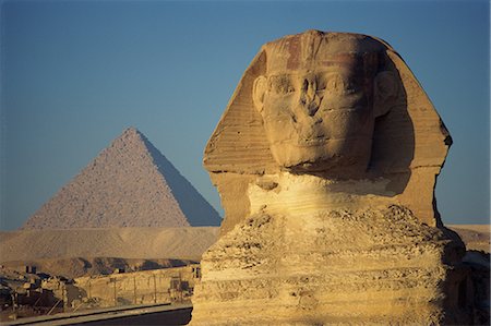 sphinx - The Sphinx and one of the pyramids at Giza, UNESCO World Heritage Site, Cairo, Egypt, North Africa, Africa Stock Photo - Rights-Managed, Code: 841-02711579