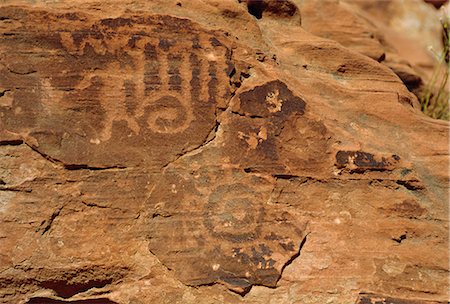 Petroglyphs drawn in sandstone by Anasazi indians around 500AD, Valley of Fire State Park, Nevada, United States of America Stock Photo - Rights-Managed, Code: 841-02712719