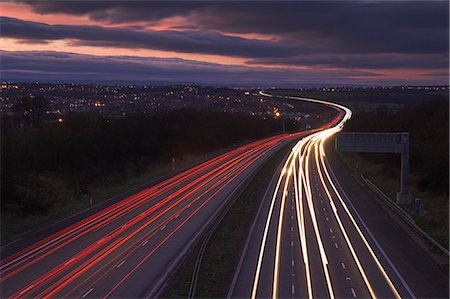 Traffic light trails in the evening on the M1 motorway near junction 28, Derbyshire, England, United Kingdom, Europe Foto de stock - Con derechos protegidos, Código: 841-02713859
