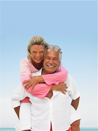 simsearch:841-02720360,k - senior couple on beach hugging Stock Photo - Rights-Managed, Code: 841-02720357