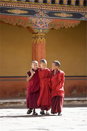 designs for decoration of pillars - Young Buddhist monks, Paro Dzong, Paro, Bhutan, Asia Stock Photo - Rights-Managed, Code: 841-02720524