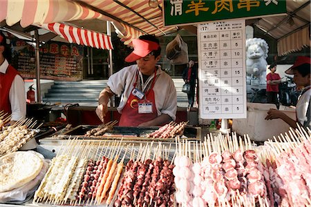 Food vendor in Wangfujing Snak Road, Wangfujing Dajie Shopping district, Beijing (Peking), China, Asia Stock Photo - Rights-Managed, Code: 841-02720868