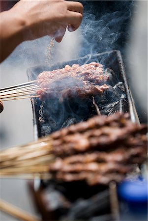 Adding spice to the barbeque, Kunming, Yunnan, China, Asia Stock Photo - Rights-Managed, Code: 841-02721359