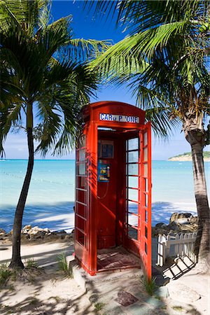 red call box - Traditional English red telephone box on the beach at Dickenson Bay, Antigua, Leeward Islands, West Indies, Caribbean, Central America Stock Photo - Rights-Managed, Code: 841-02722232