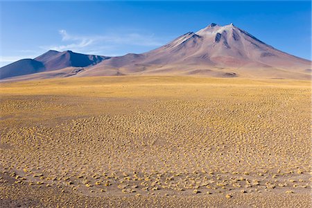 The altiplano at an altitude of over 4000m and the peak of Cerro Miniques at 5910m, Los Flamencos National Reserve, Atacama Desert, Antofagasta Region, Norte Grande, Chile, South America Stock Photo - Rights-Managed, Code: 841-02722340