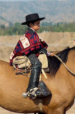 simsearch:841-02946644,k - Young rider at the Fiesta de Cuasimodo, a traditional festival one week after Easter, La Barnechea, in Santiago, Chile, South America Stock Photo - Rights-Managed, Code: 841-02722791