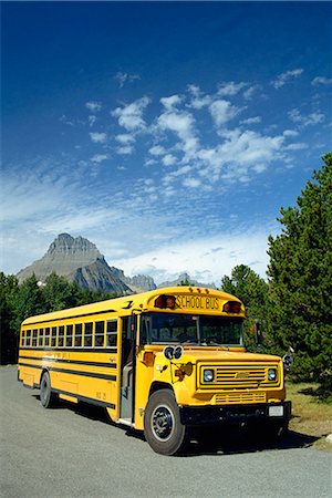 school bus - Yellow school bus, for students on geology field trip, Waterton Glacier International Peace Park, Rocky Mountains, Montana, United States of America, North America Stock Photo - Rights-Managed, Code: 841-02722811