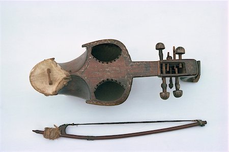 pakistan - Stringed musical instrument and bow, the Sarina or Suroze, in Pakistan, Asia Stock Photo - Rights-Managed, Code: 841-02824278