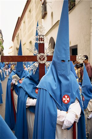 simsearch:841-06807735,k - Hooded penitents around a cross in the Holy Week procession in Seville, Andalucia, Spain, Europe Stock Photo - Rights-Managed, Code: 841-02831222