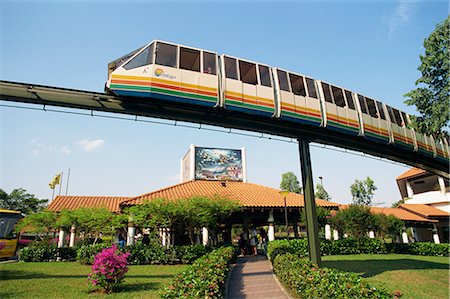 Monorail passes above Underwater World on Sentosa Island, Singapore, Southeast Asia, Asia Stock Photo - Rights-Managed, Code: 841-02831280