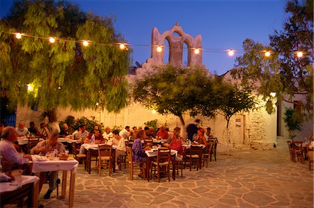 Tourists at open air taverna in the evening on Folegandros, Cyclades Islands, Greek Islands, Greece, Europe Stock Photo - Rights-Managed, Code: 841-02899641