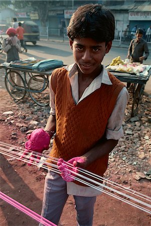 Kite string production, string is coated in ground glass for fighting kite festival in January, Ahmedabad, Gujarat state, India, Asia Stock Photo - Rights-Managed, Code: 841-02900462