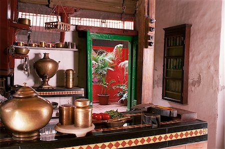 Kitchen area with traditional brass cooking utensils and samovar in restored traditional Pol house, Ahmedabad, Gujarat state, India, Asia Stock Photo - Rights-Managed, Code: 841-02900478