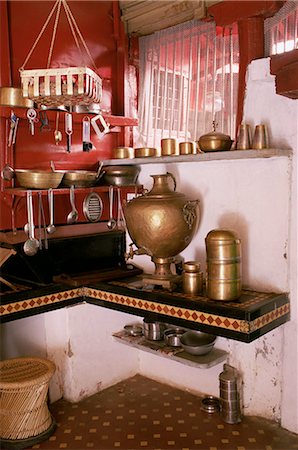 Kitchen area with traditional brass cooking utensils and samovar in restored traditional Pol house, Ahmedabad, Gujarat state, India, Asia Stock Photo - Rights-Managed, Code: 841-02900605