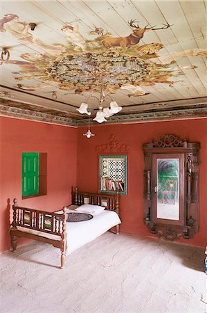 Traditional mud floor contrasting with the magnificently painted ceiling in restored traditional Pol house, Ahmedabad, Gujarat state, India, Asia Stock Photo - Rights-Managed, Code: 841-02900608