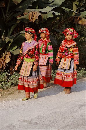 Group of three Flower Hmong women in traditional dress, south of Sapa, North Vietnam, Vietnam, Indochina, Southeast Asia, Asia Stock Photo - Rights-Managed, Code: 841-02901311
