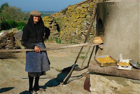 Woman baking bread, Alentejo, Portugal, Europe Stock Photo - Rights-Managed, Code: 841-02902125