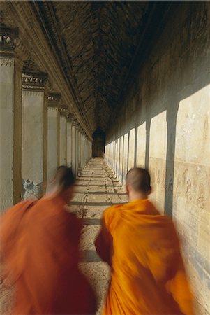 simsearch:841-03067430,k - Buddhist monks in passageway, Angkor Wat, UNESCO World Heritage Site, Siem Reap, Cambodia, Indochina, Asia Stock Photo - Rights-Managed, Code: 841-02902875