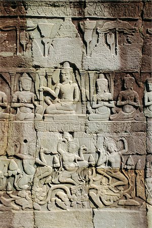 simsearch:841-02718675,k - Pierre de bas-reliefs représentant des scènes de la vie rurale et des événements historiques, dans le complexe du Temple Bayon, Angkor, Siem Reap, Cambodge Photographie de stock - Rights-Managed, Code: 841-02903393