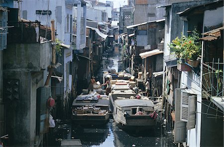 simsearch:841-02705251,k - Narrow waterway between houses, Ho Chi Minh City (formerly Saigon), Vietnam, Indochina, Southeast Asia, Asia Stock Photo - Rights-Managed, Code: 841-02916485