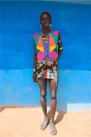 Tsemay man in colourful clothing at weekly market, Key Afir, Lower Omo Valley, Ethiopia, Africa Stock Photo - Rights-Managed, Code: 841-02916969