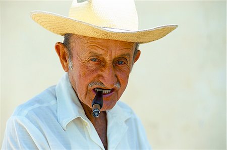 simsearch:841-02946648,k - Portrait of a man with a Cuban cigar, Trinidad, Sancti Spiritus province, Cuba, West Indies, Central America Stock Photo - Rights-Managed, Code: 841-02918006