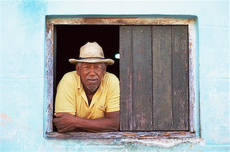 simsearch:841-07081838,k - Man leaning out of the window of his house, Trinidad, Cuba, West Indies, Central America Stock Photo - Rights-Managed, Code: 841-02918077