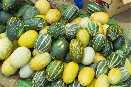Yellow, green and speckled melons piled up for sale in Chiang Mai, Thailand, Southeast Asia, Asia Stock Photo - Rights-Managed, Code: 841-02918536