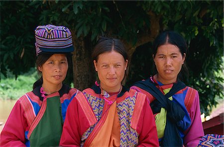 Portrait of three women of the Lisu hill tribe at the Chiang Dao Elephant Training Centre in Chiang Mai, Thailand, Southeast Asia, Asia Stock Photo - Rights-Managed, Code: 841-02918556
