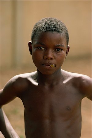 Boy with cigarette, Niamey, Niger, West Africa, Africa Stock Photo - Rights-Managed, Code: 841-02918614