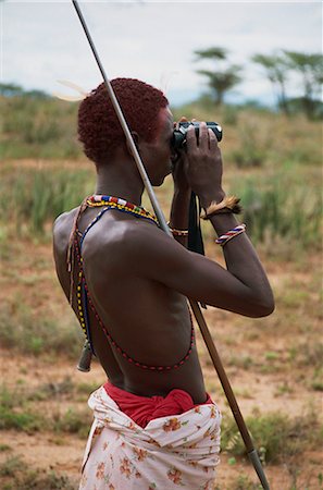 Samburu Moran (warrior) using binoculars, Kenya, East Africa, Africa Stock Photo - Rights-Managed, Code: 841-02918820