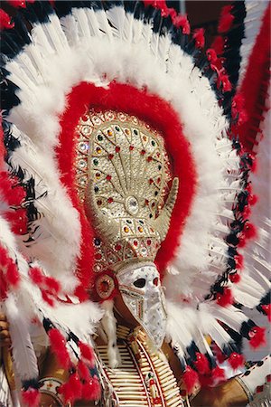 simsearch:841-02714288,k - Feather headdress and elaborate costume in Mardi Gras parade, New Orleans, Louisiana, United States of America Stock Photo - Rights-Managed, Code: 841-02919040