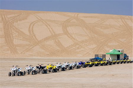 Quad bikes, desert dunes, Qatar, Middle East Stock Photo - Rights-Managed, Code: 841-02919567