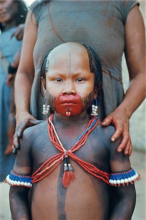 simsearch:841-02709392,k - Portrait of a Kuben Kran Keen Indian child with facial decoration in Brazil, South America Stock Photo - Rights-Managed, Code: 841-02924020