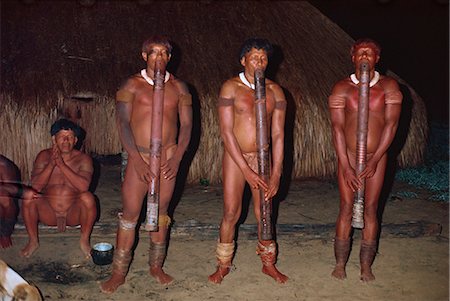 simsearch:841-02709392,k - A group of Yawalapiti Indians playing Jabui flutes at night in Brazil, South America Stock Photo - Rights-Managed, Code: 841-02924022