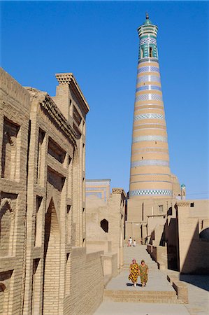 simsearch:841-02703267,k - Islam Khodja minaret, Prince Makhmud mausoleum on left, Khiva, Uzbekistan, Central Asia Stock Photo - Rights-Managed, Code: 841-02924153