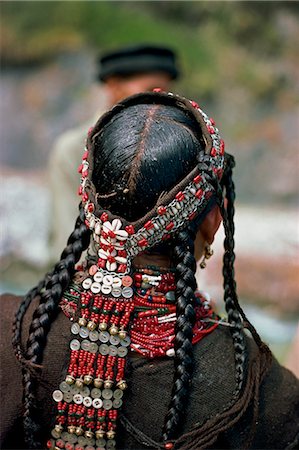 pakistan - The back view of a womans head-dress and greased hair at Rumboor in Kafiristan, Pakistan, Asia Stock Photo - Rights-Managed, Code: 841-02920226