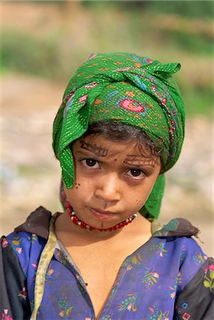 Portrait of a young girl with henna decoration on her face, Al Hajjera village, Haraz Mountains, north Yemen, Middle East Stock Photo - Rights-Managed, Code: 841-02920300