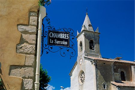 simsearch:841-03034297,k - Church tower and sign, Villes-sur-Auzon, Vaucluse, Cote d'Azur, Provence, France, Europe Stock Photo - Rights-Managed, Code: 841-02920711
