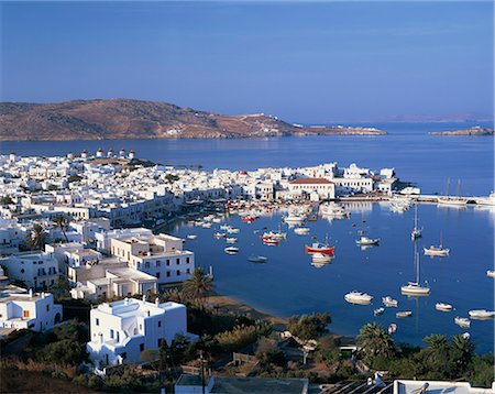 simsearch:841-05796762,k - Boats in the harbour and windmills on the coast, with the sea and hills in the background, on Mykonos, Cyclades Islands, Greek Islands, Greece, Europe Stock Photo - Rights-Managed, Code: 841-02923767
