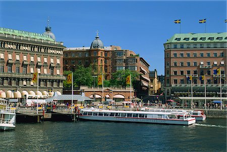 simsearch:841-02831984,k - Sightseeing boat and waterfront hotels and cafes in the city centre of Stockholm, Sweden, Scandinavia, Europe Stock Photo - Rights-Managed, Code: 841-02923885