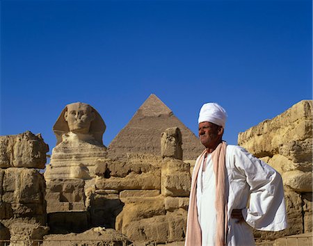 simsearch:841-02947168,k - Portrait of man in traditional dress before the Great Sphinx and the Cephren Pyramid at Giza, UNESCO World Heritage Site, Cairo, Egypt, North Africa, AFrica Foto de stock - Con derechos protegidos, Código: 841-02944377