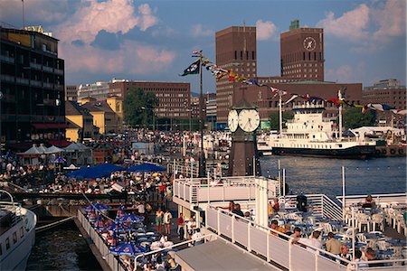 simsearch:841-02831984,k - Open air restaurants around harbour, with the clock tower, and the Town Hall behind, Oslo, Norway, Scandinavia, Europe Stock Photo - Rights-Managed, Code: 841-02945698