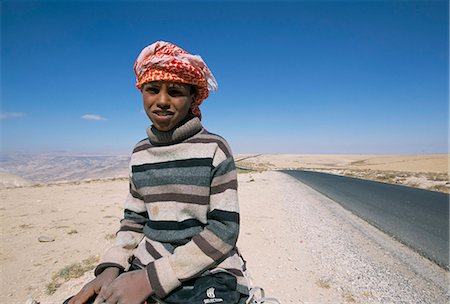 simsearch:841-02946644,k - Thirteen year old Bedouin boy on a donkey, Shoubek, Jordan, Middle East Stock Photo - Rights-Managed, Code: 841-02946924