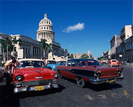 simsearch:841-03035281,k - Street scene of old American automobiles used as taxis parked near the Capitolio Building in Central Havana, Cuba, West Indies, Central America Stock Photo - Rights-Managed, Code: 841-02947047