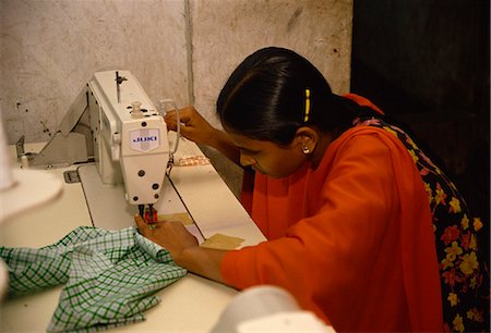 dhaka - Woman working in garment factory, Dhaka, Bangladesh, Asia Stock Photo - Rights-Managed, Code: 841-02947141